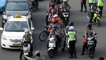  Situasi Uji Coba Pembatasan Sepeda Motor Terkendali