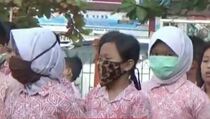 Terganggu Asap, Warga Palangkaraya Gunakan Masker