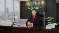 Dirut Pegadaian Raih Dua Penghargaan CEO 2021
