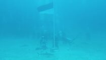 Lanal Morotai dan Jababeka Kibarkan Bendera di Bawah Laut