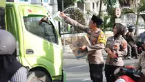 Kapolresta Palu Pimpin Aksi Bagi Takjil
