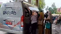 Jelang Lebaran, Ratusan Warga Mojokerto Antre 2 Jam Tukar Uang Baru