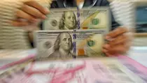 Rupiah Semakin Tertekan Terhadap Dolar AS