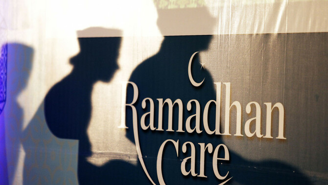 Foto bayangan peserta Ramadhan Care Buka Puasa Bersama Karyawan FirstMedia dan BeritaSatu Media Holdings.