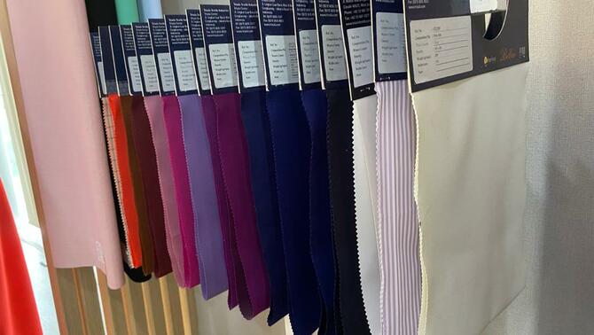 Ilustrasi Emiten penyedia kain, seragam, dan fashion yakni PT Trisula Textile Industries Tbk (BELL).
