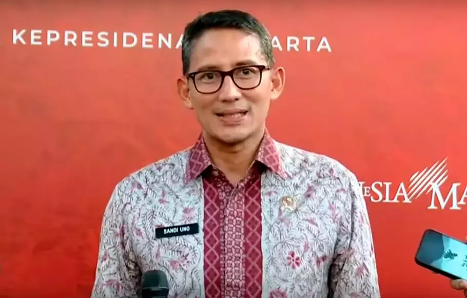 Sandiaga Uno memberikan keterangan pers seusai bertemu Presiden Jokowi di Istana Kepresidenan, Jakarta Pusat, Kamis (27/4/2023).