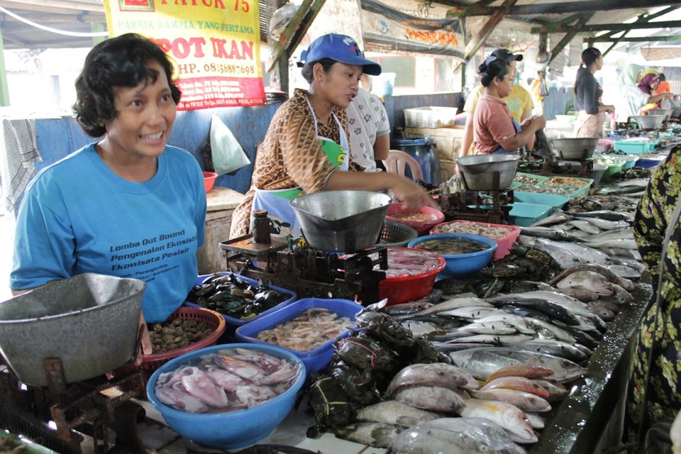 Ilustrasi pedagang ikan basah di pasar