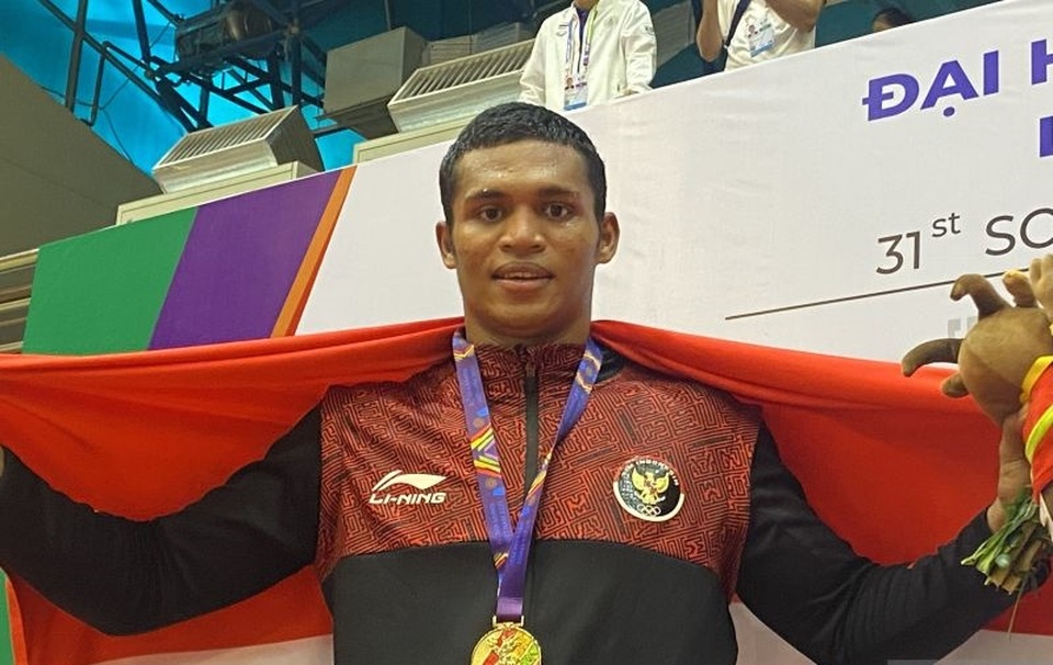 Petinju Indonesia, Maikhel Roberrd Muskita sukses meraih emas SEA Games 2021.