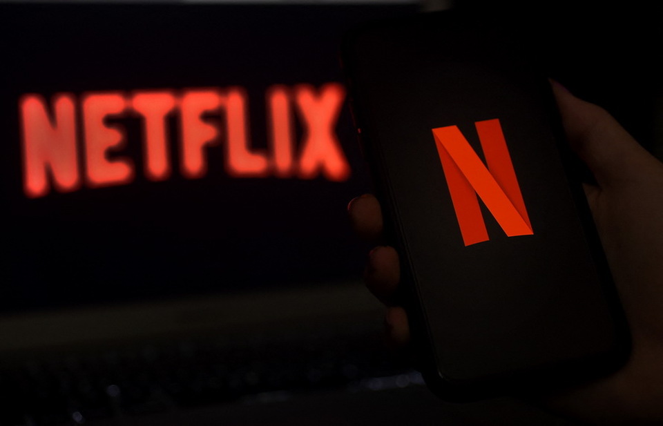 Dalam ilustrasi foto file ini yang diambil pada 31 Maret 2020, layar komputer menampilkan logo Netflix di Arlington, Virginia.