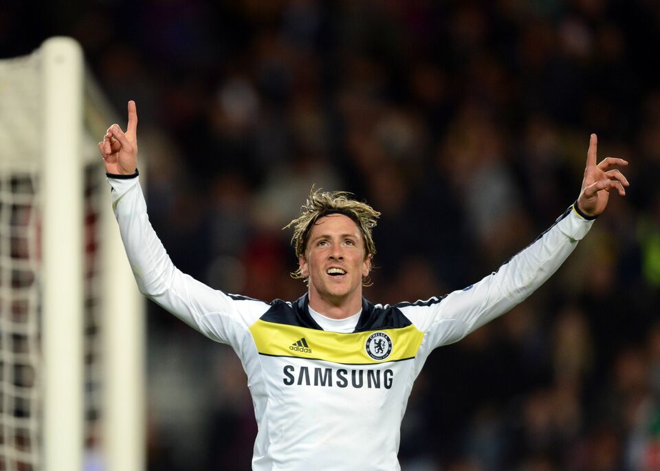 Fernando Torres (Chelsea) merayakan golnya.