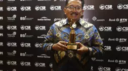 Direktur BCA Antonius Widodo, usai menerima penghargaan dalam acara CSR Awards 2023 B-Universe di Ballroom Hotel Mulia, Jakarta, Rabu (31/5/2023). (B-Universe Photo/David Gita Roza)