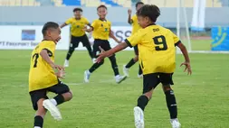 Selebrasi pemain SSB Nusa Gemilang usai mencetak gol pada pertandingan final kategori U-10 melawan WCP Pasopati. (Freeport)