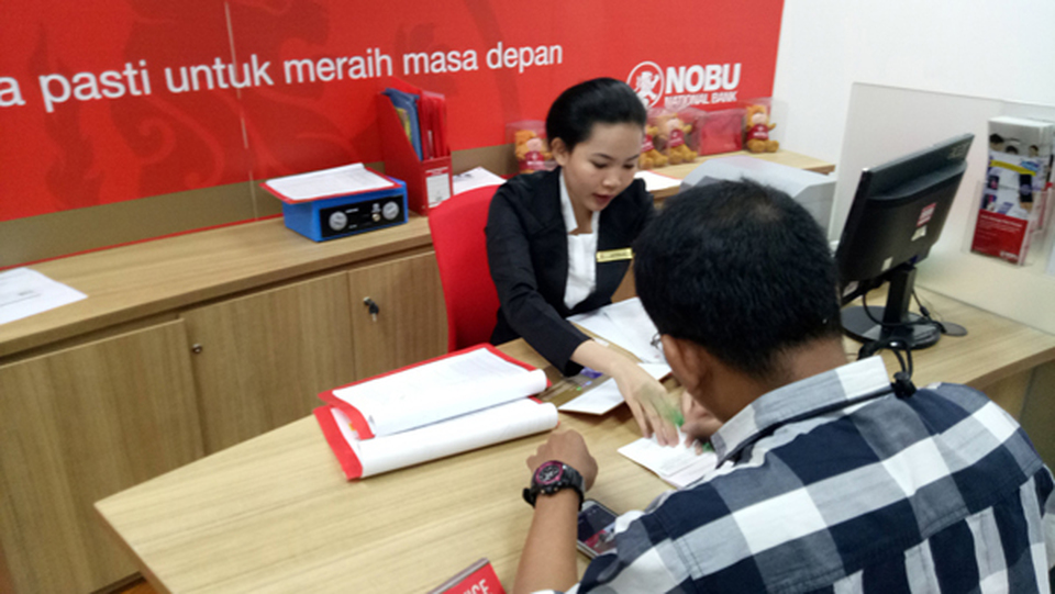 Pelayanan nasabah di Bank Nobu. (Foto ilustrasi: Dok. B-Universe)