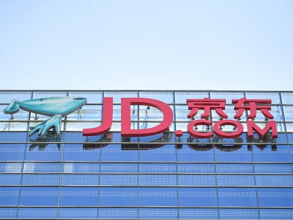 Logo perusahaan e-commerce Tiongkok JD.com Inc. ( Foto: AFP )