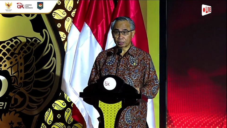 Ketua Dewan Komisioner OJK Wimboh Santoso dalam Rakornas Tim Percepatan Akses Keuangan Daerah (TPAKD) 2021 yang digelar secara hybrid di Jakarta, Kamis (16/12). Foto: Investor Daily/Prisma Ardianto
