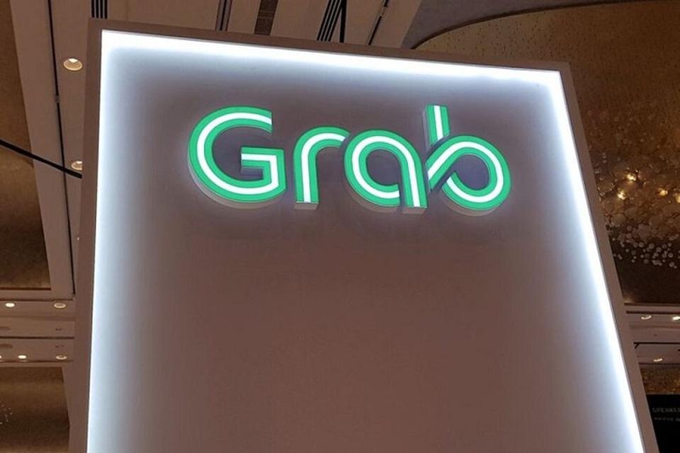 Logo Grab terlihat di Money 20/20 Asia Fintech Trade Show di Singapura, beberapa waktu lalu. (FOTO: REUTERS/Anshuman Daga/File Photo)