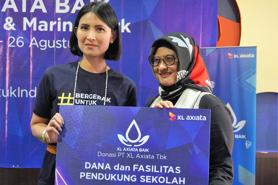 Presiden Direktur & CEO XL Axiata Dian Siswarini (kanan). (IST)