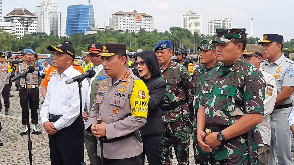 Polri menggelar Apel Gelar Pasukan Operasi Lilin 2022 di Lapangan Cawas Selatan Monas, Jakarta Pusat, Kamis (22/12/2022). 