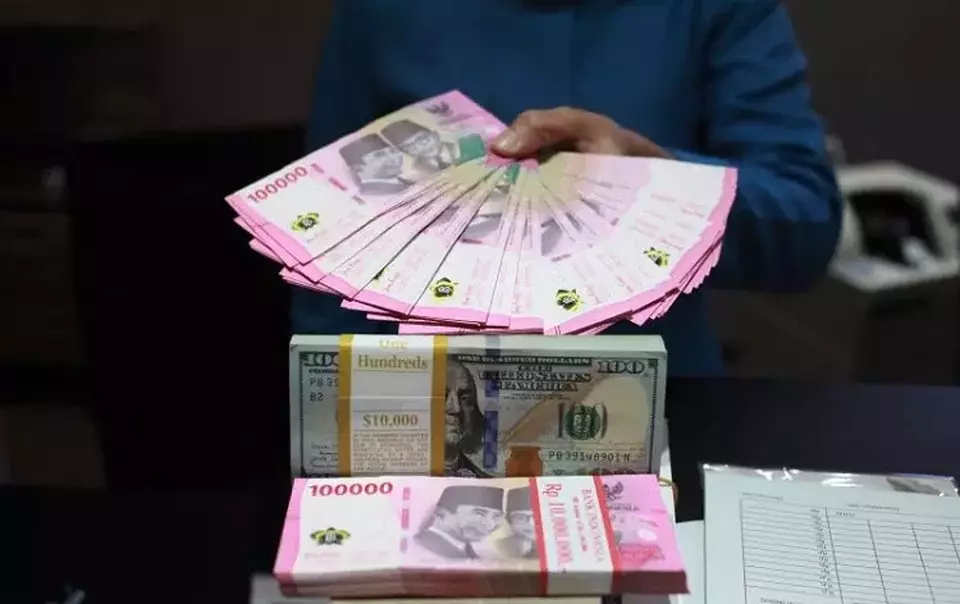   Nilai tukar (kurs) rupiah terhadap dolar AS (Foto: ANTARA FOTO/Reno Esnir/tom)