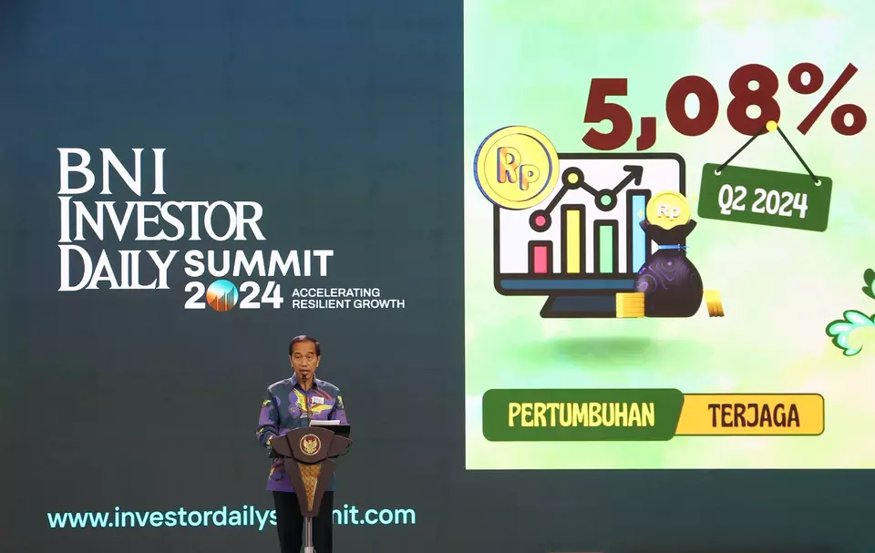 Presiden Joko Widodo (Jokowi) saat memberikan sambutan dalam pembukaan acara BNI Investor Daily Summit 2024 di Jakarta Convention Center (JCC), Senayan, Jakarta, Selasa (8/10/2024). (B-Universe Photo/Joanito De Saojoao)
