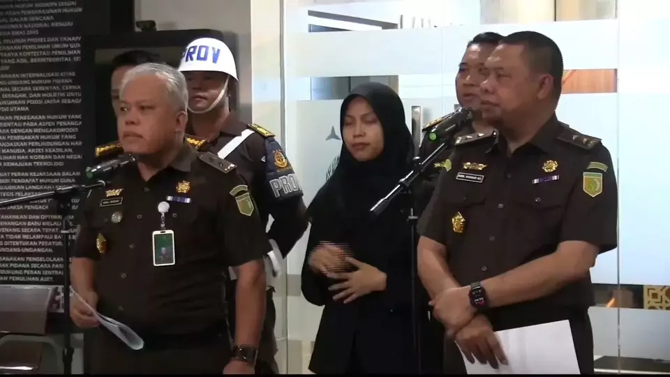 Direktur Penyidikan Jampidsus Kejaksaan Agung, Abdul Qohar dan Kapuspenkum Harli Siregar saat konferensi pers.