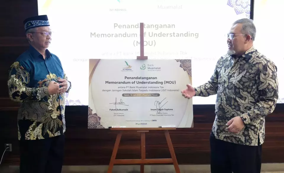 Seremoni penandatanganan nota kesepahaman (memorandum of understanding/MoU) antara Bank Muamalat dan JSIT Indonesia. (Foto: istimewa)
