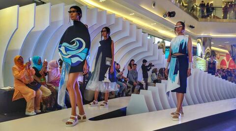 East Meets West Runway Show in the Fashion Show Mall Photograph by