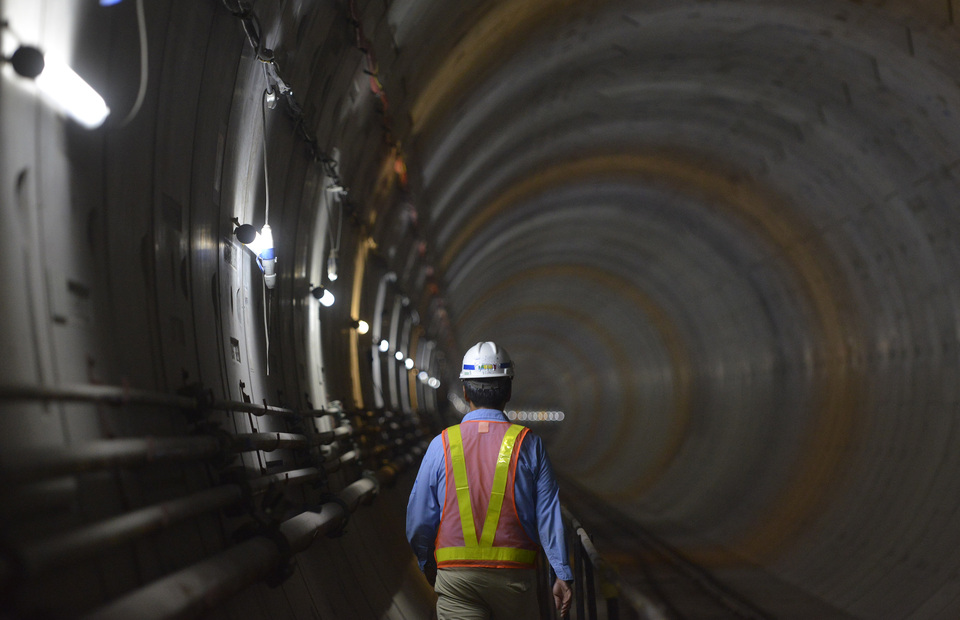 A worker walks through an MRT tunnel under construction in Senayan, Jakarta. (Antara Photo/Rosa Panggabean)