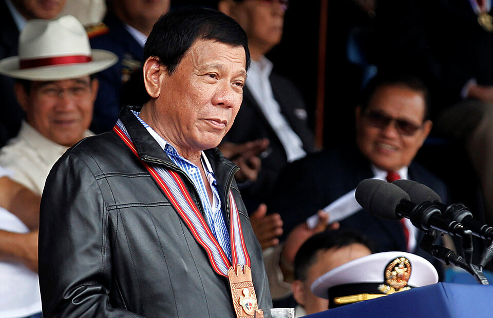 Philippine President Rodrigo Duterte delivers a speech during the Philippine Military Academy (PMA) alumni homecoming in Fort Del Pilar, Baguio city, north of Manila, Philippines February 18, 2017. (Reuters Photo/Harley Palangchao)