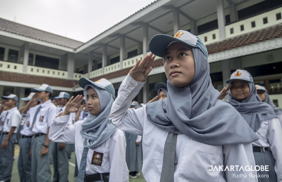 Students attend a school assembly at a senior high school on Pramuka Island, north of Jakarta. (JG Photo/Yudha Baskoro)