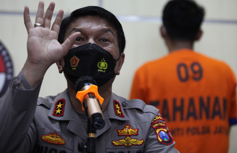 East Java Police Chief Insp. Gen. Nico Afinta, left, speaks at a news conference in Surabaya on Oct. 25, 2021. (Antara Photo)