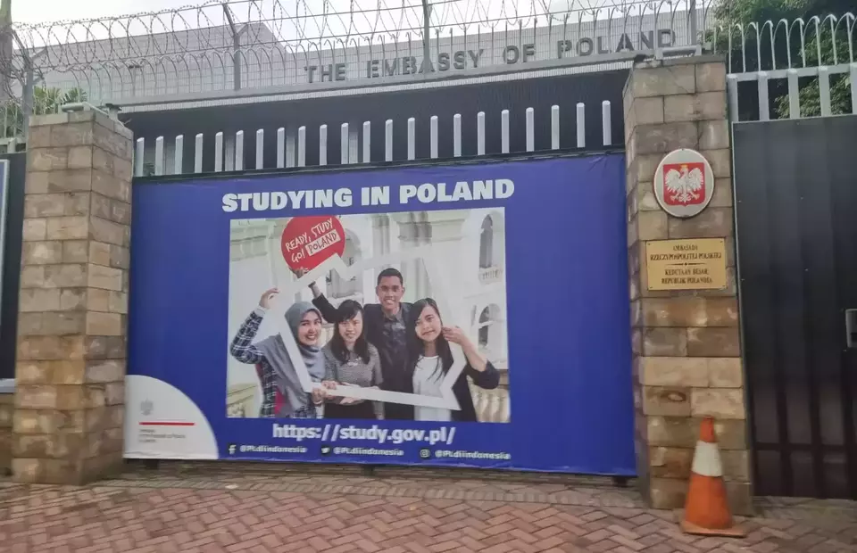 A banner promoting the idea of studying in Poland as seen just outside the Polish Embassy in Jakarta on Feb. 8, 2023. Outside of trade, the Polish embassy is focusing on taking more Indonesian students in the coming years (JG Pphoto /Oliver Dixon)