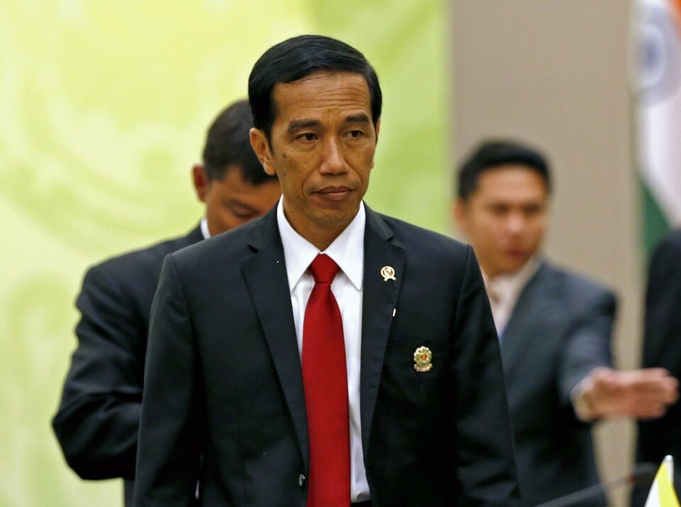 President Joko Widodo must navigate the economic demands of rival regional partnerships alongside finding the best outcome for Indonesia. (EPA Photo/Rungroj Yongrit)