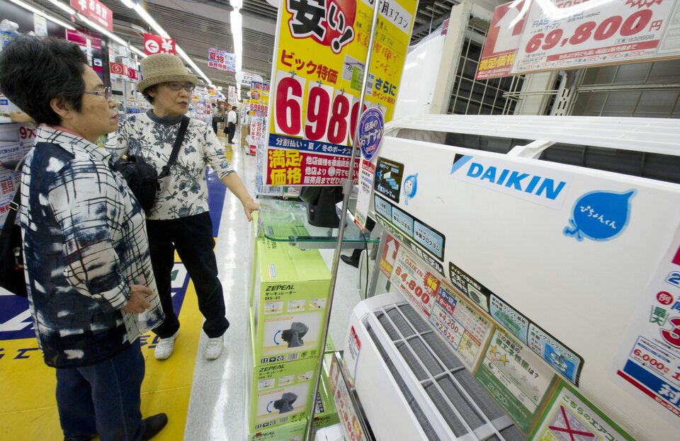 A file photo dated Aug. 29, 2012 showing Daikin home air conditioners on sale at an electronics store in downtown in Tokyo, Japan. (EPA Photo/Everett Kennedy Brown)
