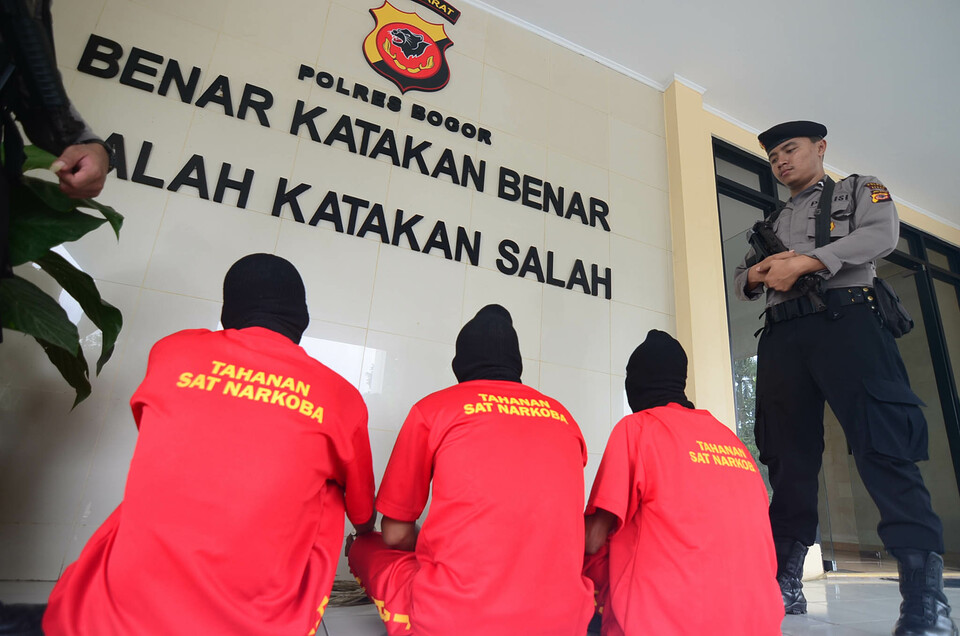 Drug suspects held by police in Bogor, earlier this month. (Antara Photo//Jafkhairi)