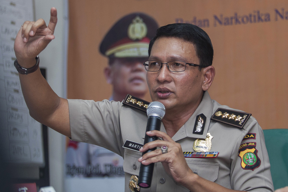 National Police spokesman Chief Comr. Martinus Sitompul said on Tuesday (20/12) that three people have been arrested over a suspected plot to carry out a suicide bomb attack in an undisclosed location outside Java. (Antara Photo/Sigid Kurniawan)