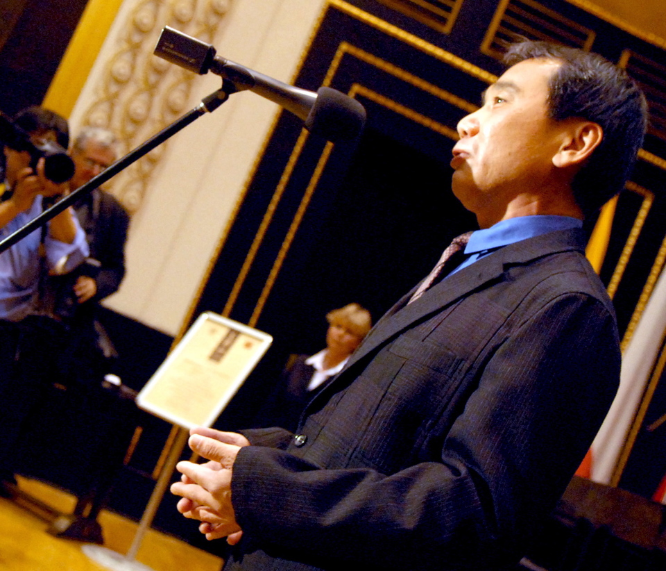 Japanese writer Haruki Murakami delivers his speech during the award ceremony of the Franz Kafka Award 2006 in the Old Town Hall in Prague, Monday  30 October 2006.  (EPA Photo/Filip Singer)
