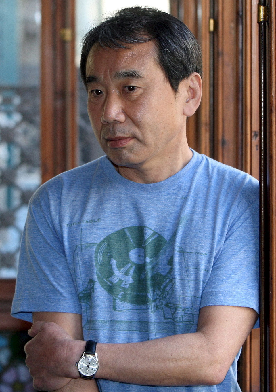 Japanese writer Haruki Murakami poses during his first public meeting with Spanish readers in Barcelona, Spain, in 2009. (EPA Photo/Andreu Dalmau)