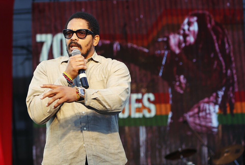 Rohan Marley, son of late reggae legend Bob Marley, addresses the audience during an event in celebration of the 70th anniversary of the birth of the late reggae legend, in Kingston February 6, 2015. Jamaicans celebrate Marley's 70th birthday on Friday with a jamming session at his former home and a free concert as the Caribbean island continues to wrestle over his place in its pantheon of heroes. Marley, who was born in Nine Miles, northwest Jamaica, died on May 11, 1981, in a Florida hospital from cancer age 36. (Reuters Photo/Gilbert Bellamy)