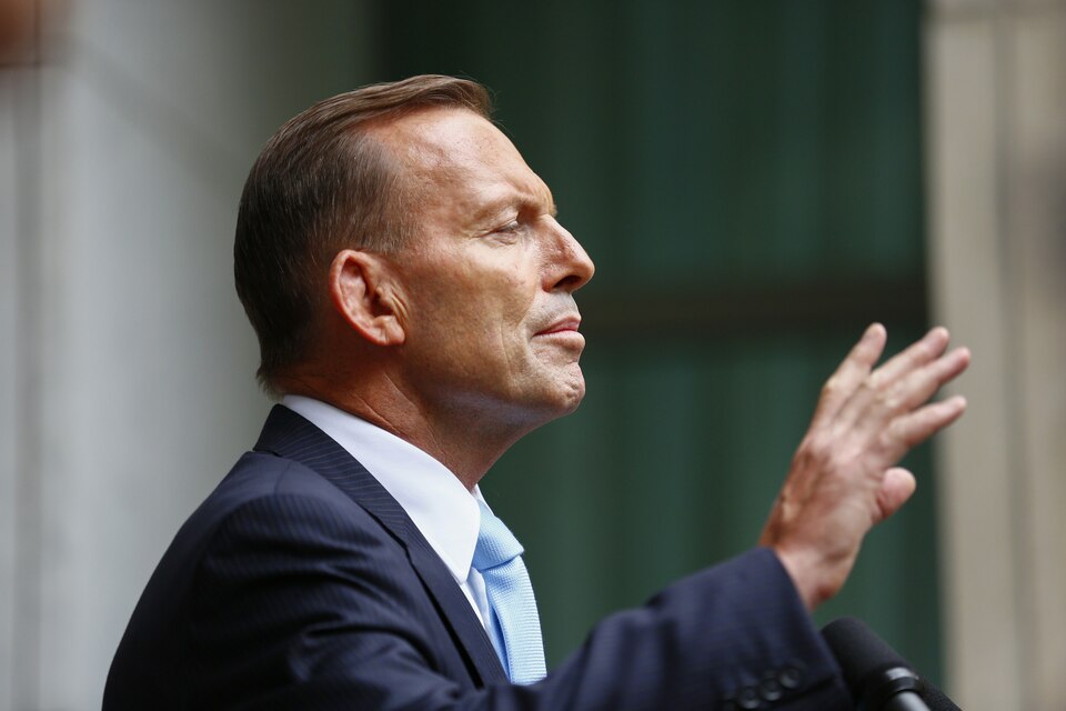 Australian Prime Minister Tony Abbott has told parliament at least 70 Australians were fighting in Iraq and Syria backed by about 100 Australia-based 'facilitators.' (Reuters Photo/Sean Davey)