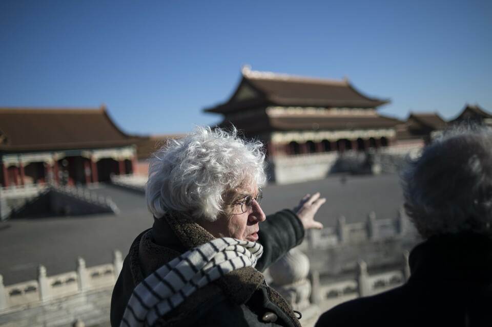 French film director Jean-Jacques Annaud speaks to journalists as French Prime Minister Manuel Valls visits the Forbidden City in Beijing on January 30, 2015. Valls is in China on a three-day trip. (AFP Photo/Fred Dufour)