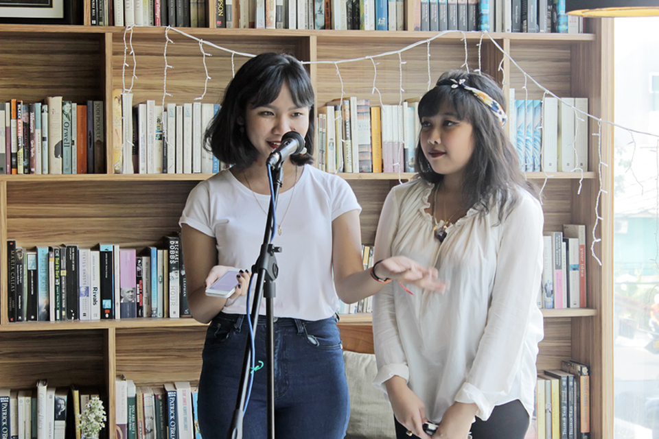 Rain Chudori, left,  and Syarafina Vidyadhana launched the first of what they hope to be many issues of the Murmur journal. (Photo courtesy of Devi Merakati)