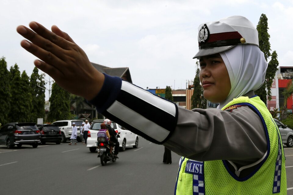 Indonesia needs more female police officers to truly progress in gender equality and the protection of its women, says Irawati Harsono.  (EPA Photo/Hotli Simanjuntak) 