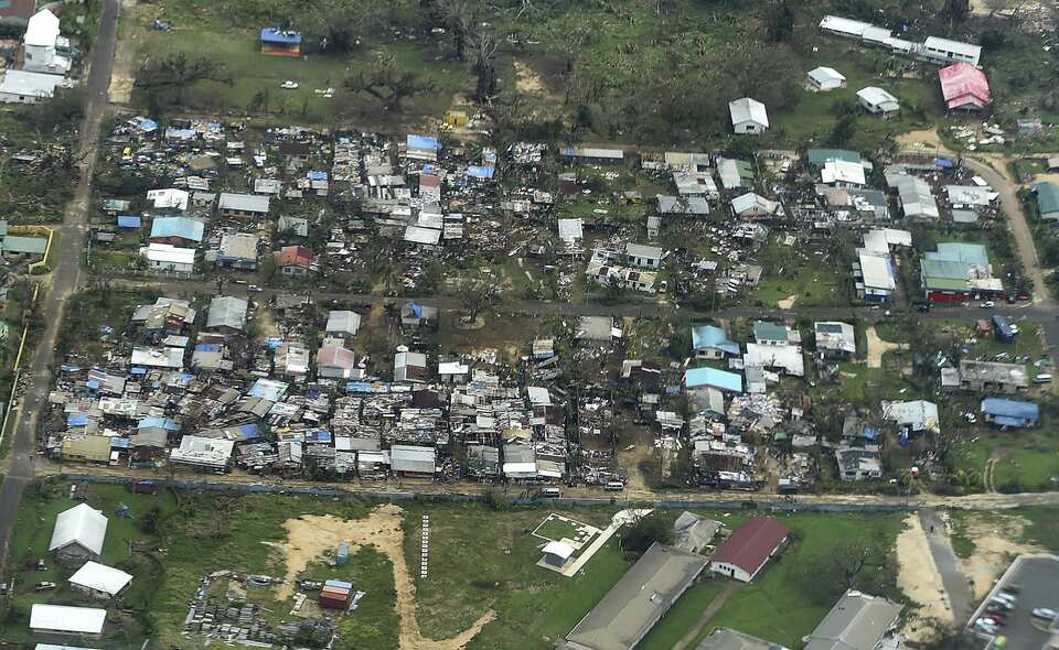 An aerial view shows homes destroyed by Cyclone Pam in Port Vila, the capital city of the Pacific island nation of Vanuatu on March 16, 2015.     (Reuters Photo/Dave Hunt/Pool)