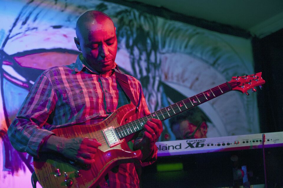 Girum Mezmur, Ethiopian guitarist, and part owner of Jazzamba Club, performs during a Jam session at Mamas Kitchen in Addis Ababa on February 16, 2015. Ethiopian musicians were spreading out to clubs and bars around town to play live music after a fire destroyed last January Jazzamba jazz club, a reference for Ethio-jazz in Addis Ababa. The club was inside the oldest hotel in the country, Taitu, which was established in the early 20th century by Empress Taitu of Ethiopia. (AFP Photo/Zacharias Abubeker)