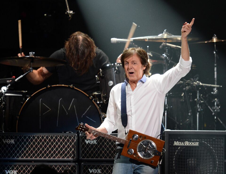 In this December 12, 2012 file photo, musician Paul McCartney performs during "12-12-12 The Concert For Sandy Relief" at Madison Square Garden in New York. Paul McCartney will headline Lollapalooza, the US counterculture festival turned Chicago fixture, as the ex-Beatle keeps up an active touring schedule. Other acts announced March 24, 2015 for Lollapalooza, which runs from July 31 to August 2, 2015, include heavy metal giants Metallica, Grammy-winning British soul singer Sam Smith and the Belgian dance music star Stromae. McCartney, 72, has an extensive touring schedule in coming months, including headlining spots at Denmark