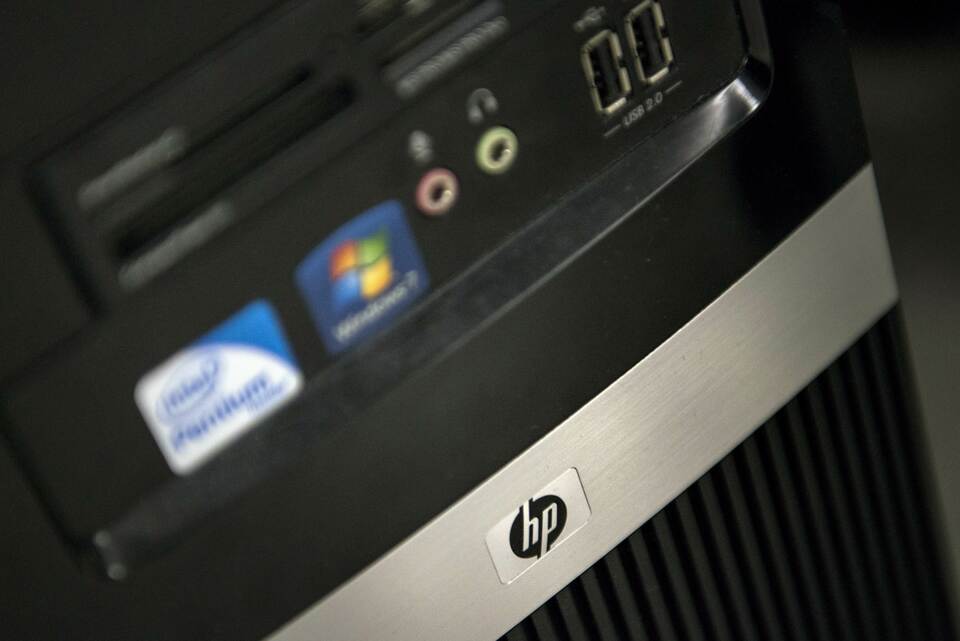 This Dec. 31, 2013 file photo shows a view of a Hewlett-Packard computer in Washington DC. (AFP Photo/Brendan Smialowski)
