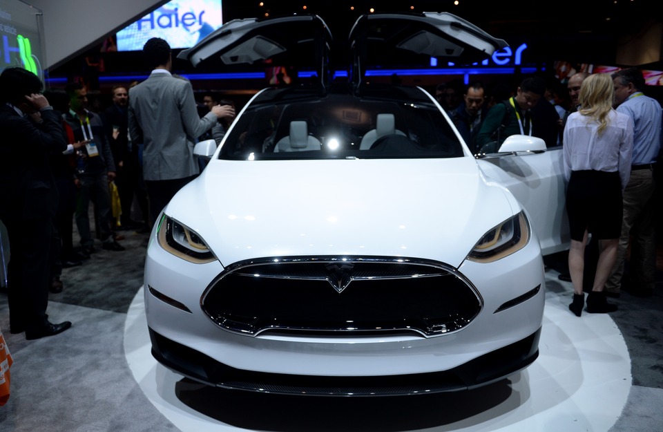 Concept car 'Model X ' of electric powered car manufacturer Tesla is on display at the stand of electonics manufacturer Panasonic during the 2015 International Consumer Electronics Show (CES) in Las Vegas, Nevada, US, on Jan. 6, 2015. Atieva is one of several startups in China and the United States focused on building electric cars to rival those of Tesla Motors Inc. (EPA Photo/Britta Pedersen)