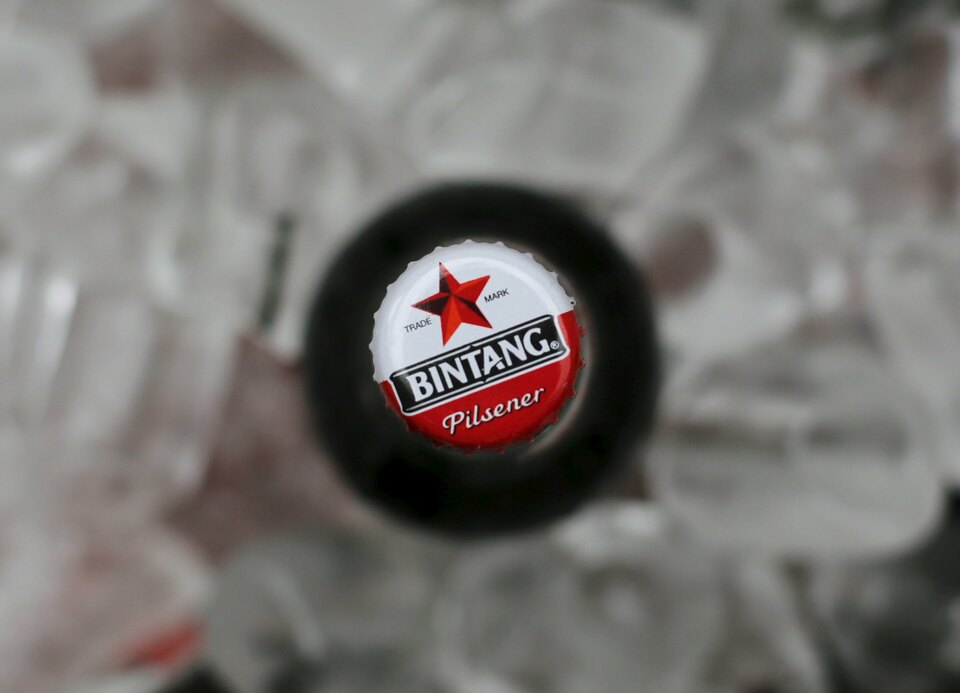 A bottle of Bintang beer chilled at a beer factory in Jakarta. (Reuters Photo/Beawiharta)