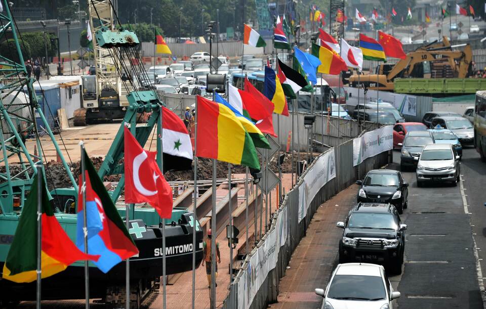 Flags from Asian and African countries are hoisted on a main street in Jakarta on April 14, 2015 in preparation for the 60th anniversary of the Asian-African Conference in Indonesia taking place between April 22-24, 2015, which leaders from Asian and African countries are attending. (AFP Photo /Bay Ismoyo)